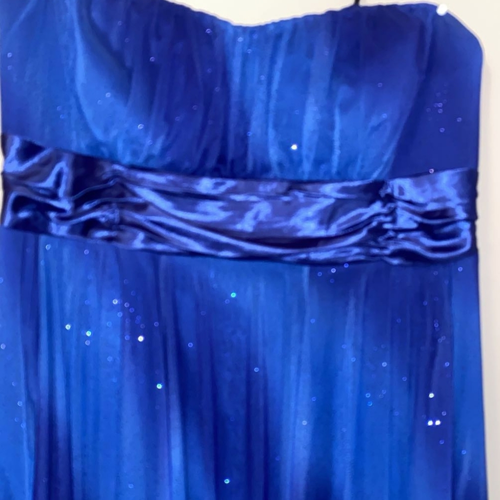A blue strapless deb dress